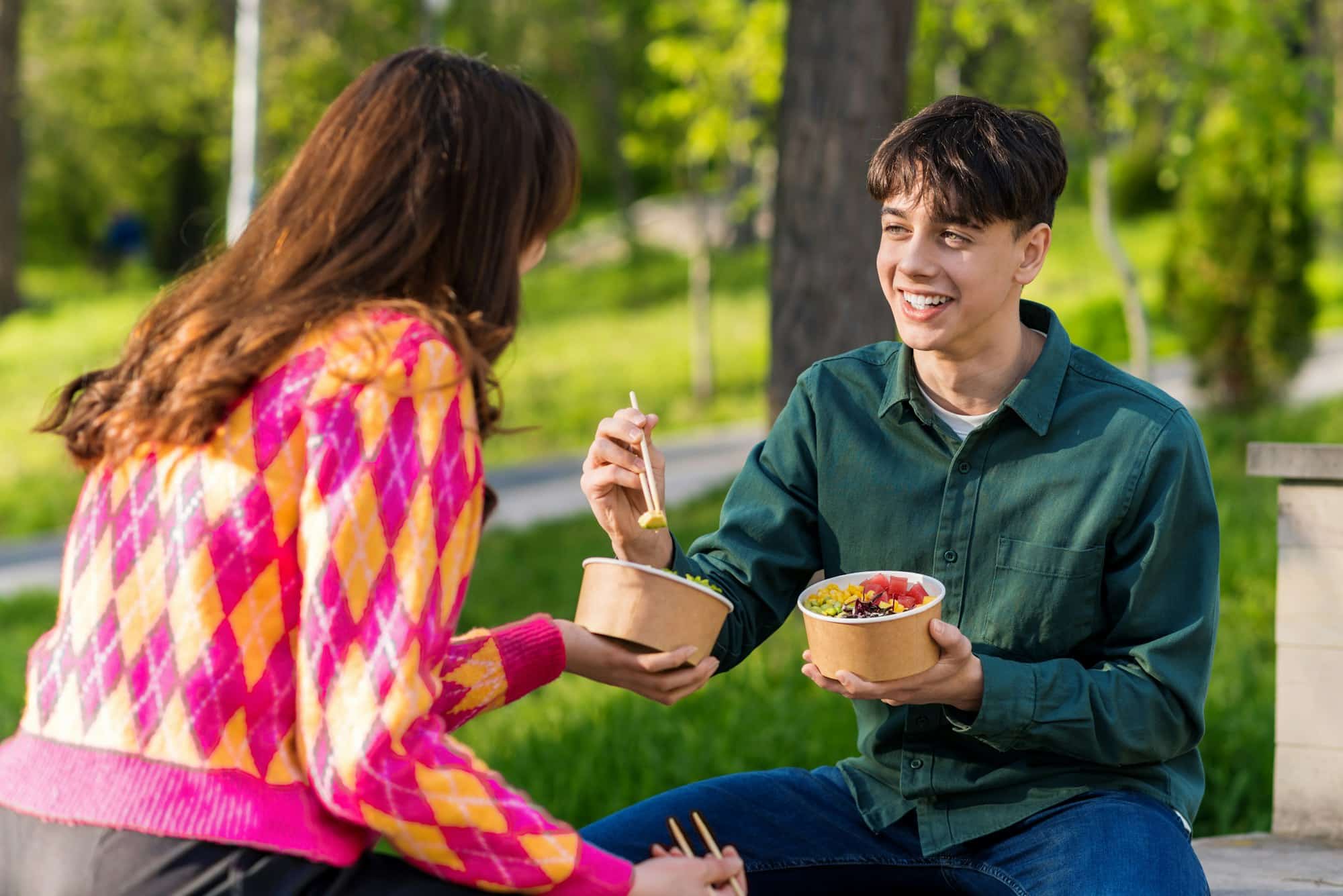 A couple eating poke